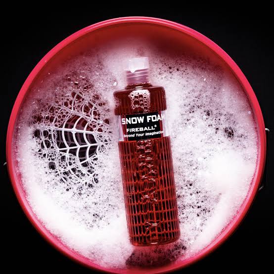 Fireball Snow Foam bottle in a foam-filled detailing bucket